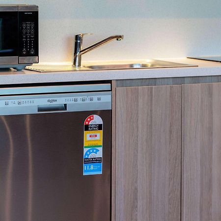 Peppers Marysville Extérieur photo A dishwasher with a water rating label